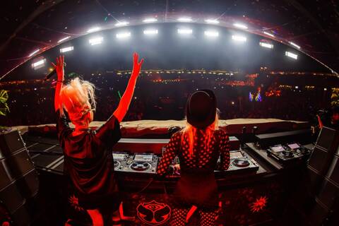 NERVO performing on the Mainstage at Tomorrowland Brasil 2025, playing for a massive crowd under vibrant festival lights.