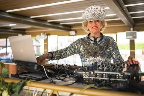 DJ Gloria, 81, performing in sequins and filling Sweden’s dancefloors. Photo: Jonathan Nackstrand/AFP.